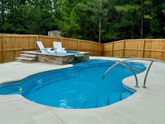 Small pool with a tanning spa added for some extra style