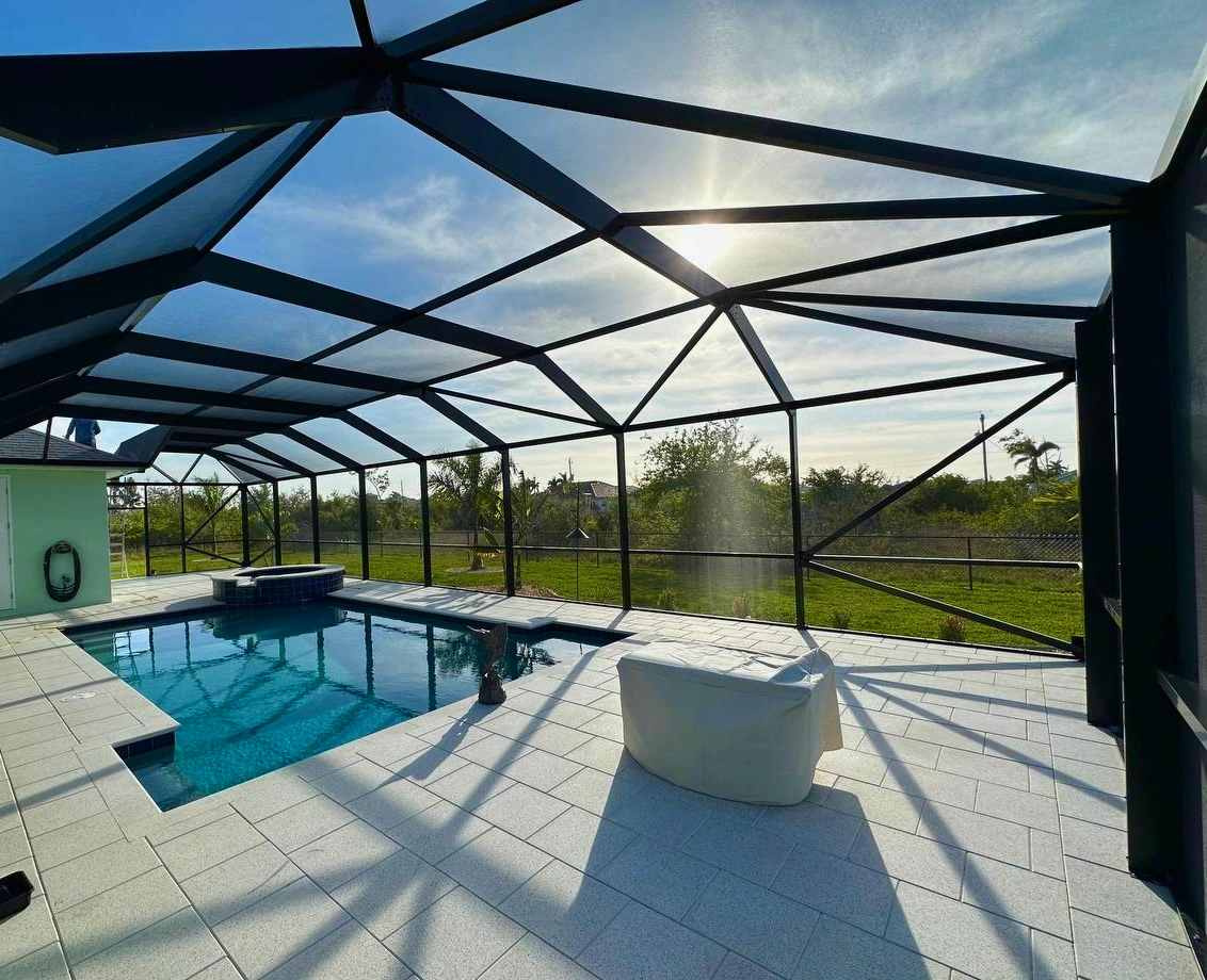 Blocking the sun with a screen enclosure over a pool